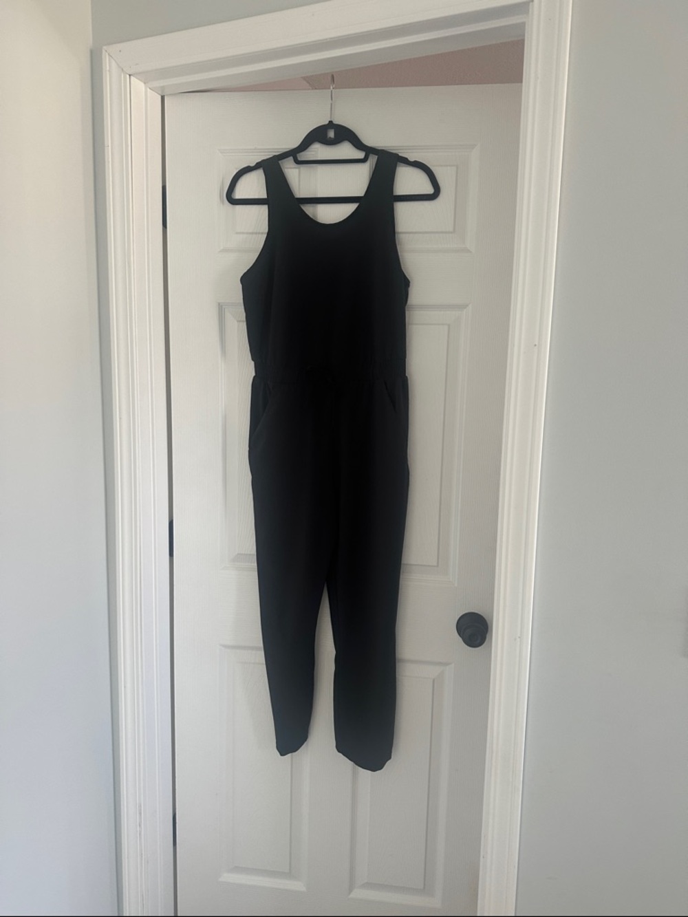 all in motion Black Sleeveless Belted Jumpsuit